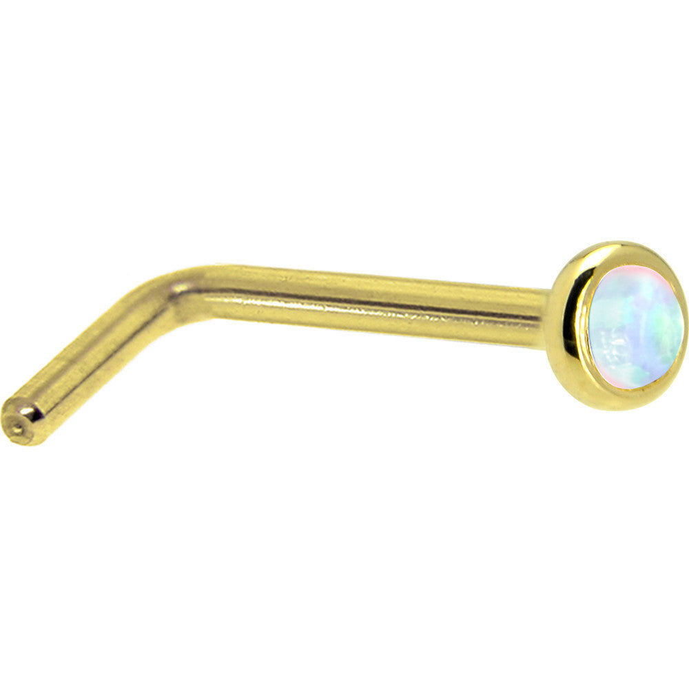 Gold nose ring with a round, multicolored gemstone on a white background