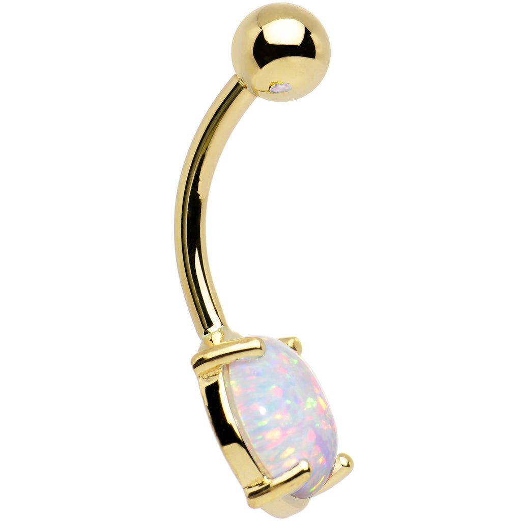 Gold belly button ring with a white opal stone on a white background