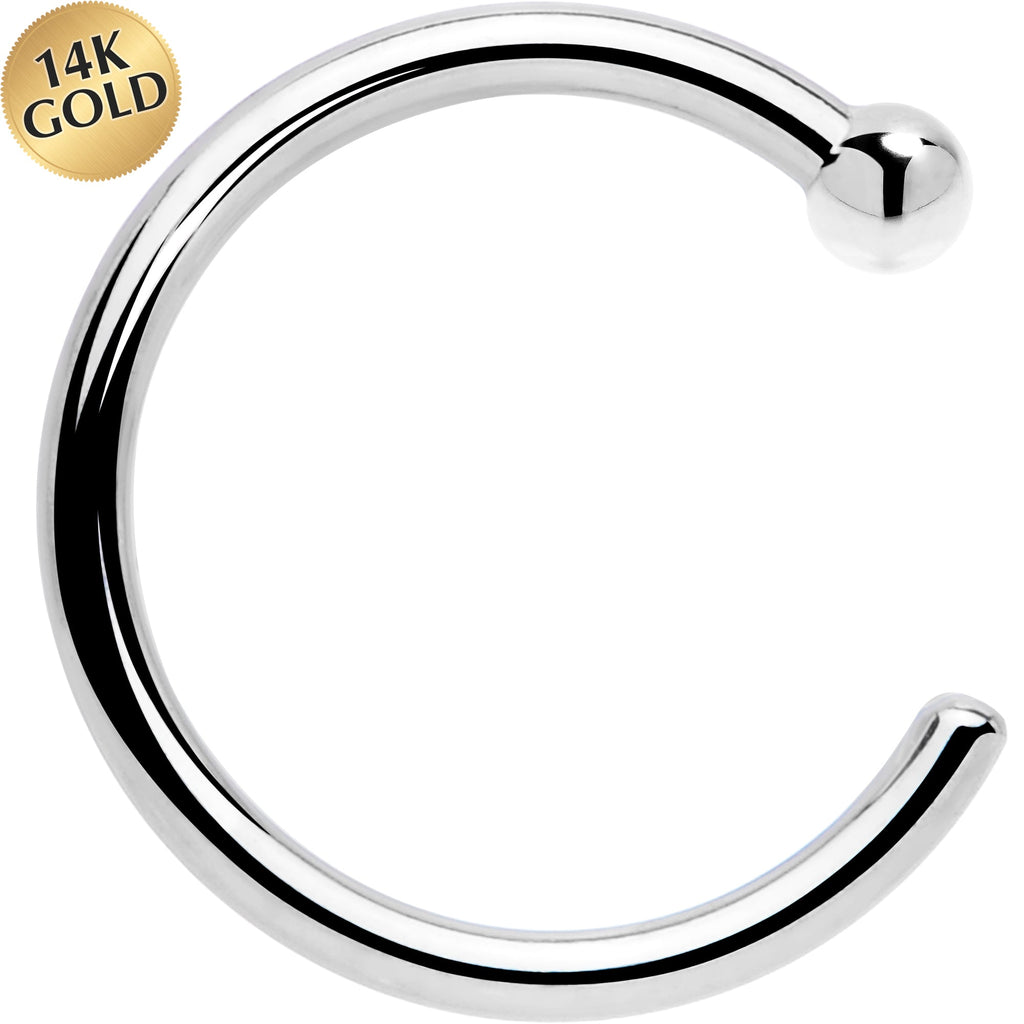 14K gold nose ring on a white background