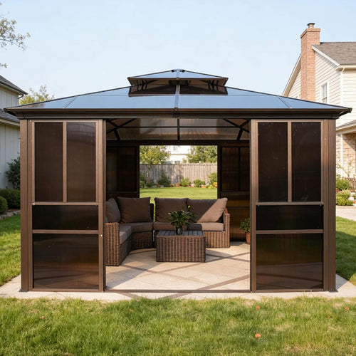 Outdoor gazebo with a sectional sofa and table in a backyard setting